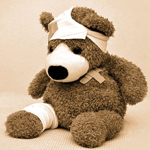 Wounded bear doll